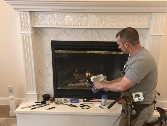 Rincon Chimney Sweep performing fireplace maintenance in Rincon, GA