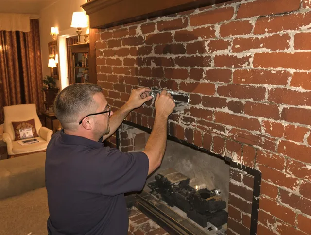 Rincon Chimney Sweep expert fixing a fireplace in Rincon, GA